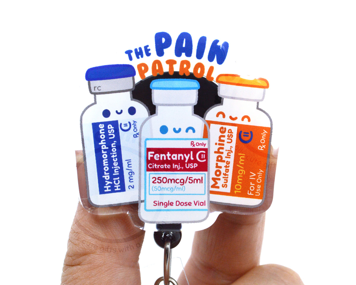 three colorful pill bottles with labels indicating different pain relief medications.
